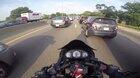 [USA] Lane splitting motorcycle gets a surprise.