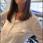 A white person telling a black man what hat he is allowed to wear