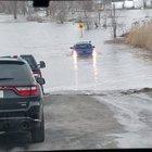 Idiot tried driving down a flooded road