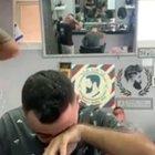 A man gets his noise hair done