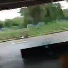 Migrants throwing food plates, shouting 