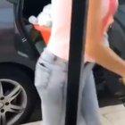 Don’t help the dog dangling out of a car