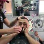 Getting his nose hair done