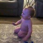 This baby has super powers her expression when she hits the bottle flip!