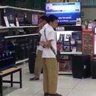 This kid absolutely killing it on a department store karaoke machine